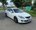 Белый Мазда 6, объемом двигателя 2 л и пробегом 150 тыс. км за 7700 $, фото 1 на Automoto.ua
