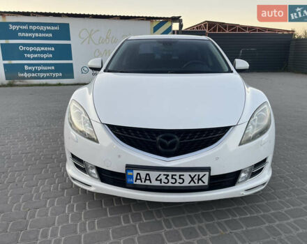 Белый Мазда 6, объемом двигателя 2 л и пробегом 255 тыс. км за 7500 $, фото 1 на Automoto.ua