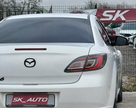 Білий Мазда 6, об'ємом двигуна 2 л та пробігом 182 тис. км за 7500 $, фото 60 на Automoto.ua