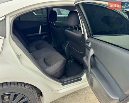 Білий Мазда 6, об'ємом двигуна 2 л та пробігом 182 тис. км за 7500 $, фото 33 на Automoto.ua