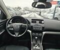 Белый Мазда 6, объемом двигателя 2 л и пробегом 234 тыс. км за 8499 $, фото 3 на Automoto.ua