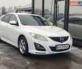 Белый Мазда 6, объемом двигателя 2 л и пробегом 234 тыс. км за 8499 $, фото 1 на Automoto.ua