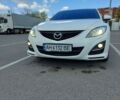 Белый Мазда 6, объемом двигателя 2 л и пробегом 282 тыс. км за 8200 $, фото 1 на Automoto.ua