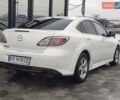 Белый Мазда 6, объемом двигателя 2 л и пробегом 234 тыс. км за 8499 $, фото 1 на Automoto.ua