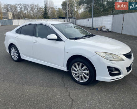 Белый Мазда 6, объемом двигателя 2 л и пробегом 165 тыс. км за 7800 $, фото 1 на Automoto.ua