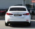 Білий Мазда 6, об'ємом двигуна 2 л та пробігом 181 тис. км за 12700 $, фото 4 на Automoto.ua