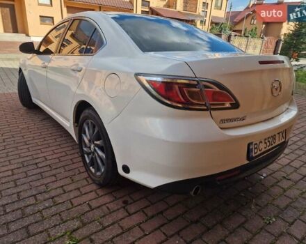 Білий Мазда 6, об'ємом двигуна 2 л та пробігом 234 тис. км за 5200 $, фото 5 на Automoto.ua