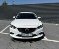 Белый Мазда 6, объемом двигателя 2.2 л и пробегом 230 тыс. км за 13500 $, фото 1 на Automoto.ua