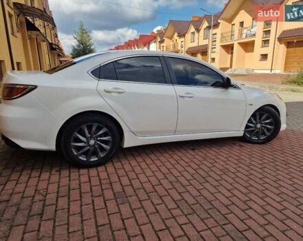 Білий Мазда 6, об'ємом двигуна 2 л та пробігом 234 тис. км за 5200 $, фото 31 на Automoto.ua
