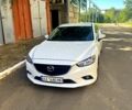 Белый Мазда 6, объемом двигателя 2 л и пробегом 230 тыс. км за 12000 $, фото 1 на Automoto.ua