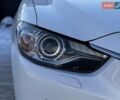Білий Мазда 6, об'ємом двигуна 2 л та пробігом 173 тис. км за 12399 $, фото 11 на Automoto.ua