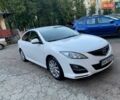 Белый Мазда 6, объемом двигателя 2 л и пробегом 122 тыс. км за 10500 $, фото 1 на Automoto.ua