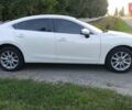 Білий Мазда 6, об'ємом двигуна 2 л та пробігом 137 тис. км за 10999 $, фото 11 на Automoto.ua