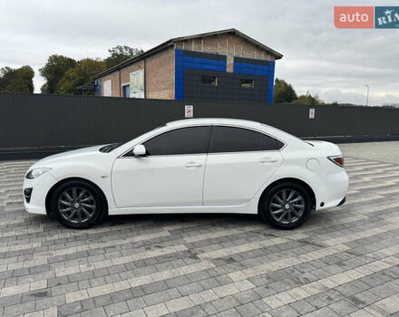 Белый Мазда 6, объемом двигателя 2 л и пробегом 340 тыс. км за 4950 $, фото 4 на Automoto.ua