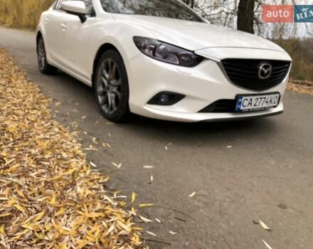 Білий Мазда 6, об'ємом двигуна 2 л та пробігом 163 тис. км за 12150 $, фото 4 на Automoto.ua