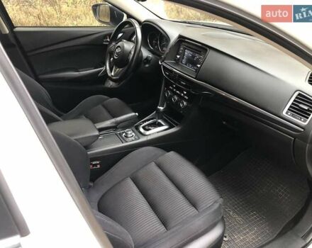 Білий Мазда 6, об'ємом двигуна 2 л та пробігом 163 тис. км за 12150 $, фото 7 на Automoto.ua