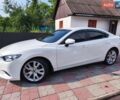 Белый Мазда 6, объемом двигателя 2 л и пробегом 222 тыс. км за 9000 $, фото 1 на Automoto.ua