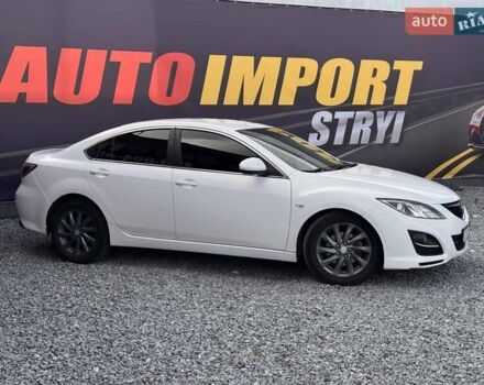 Белый Мазда 6, объемом двигателя 2 л и пробегом 345 тыс. км за 5100 $, фото 1 на Automoto.ua