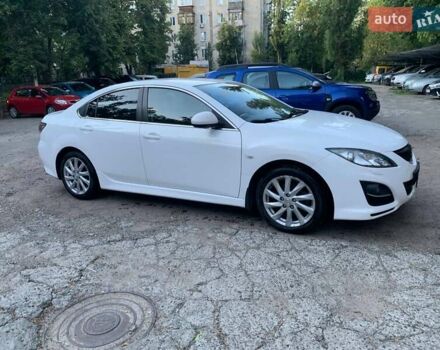 Белый Мазда 6, объемом двигателя 2 л и пробегом 122 тыс. км за 10500 $, фото 2 на Automoto.ua