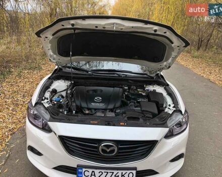 Білий Мазда 6, об'ємом двигуна 2 л та пробігом 163 тис. км за 12150 $, фото 10 на Automoto.ua