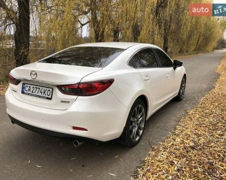 Білий Мазда 6, об'ємом двигуна 2 л та пробігом 163 тис. км за 12150 $, фото 2 на Automoto.ua