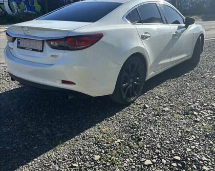 Белый Мазда 6, объемом двигателя 2.5 л и пробегом 230 тыс. км за 11000 $, фото 1 на Automoto.ua