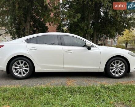 Білий Мазда 6, об'ємом двигуна 2 л та пробігом 171 тис. км за 11000 $, фото 14 на Automoto.ua