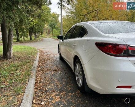 Білий Мазда 6, об'ємом двигуна 2 л та пробігом 171 тис. км за 11000 $, фото 16 на Automoto.ua