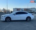 Білий Мазда 6, об'ємом двигуна 2.49 л та пробігом 180 тис. км за 10400 $, фото 3 на Automoto.ua