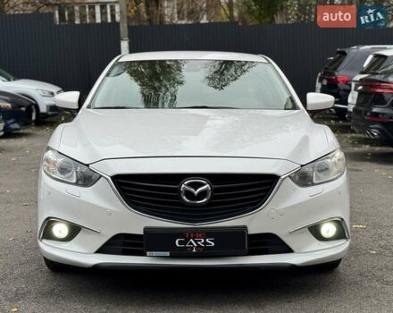 Белый Мазда 6, объемом двигателя 2 л и пробегом 171 тыс. км за 10900 $, фото 1 на Automoto.ua