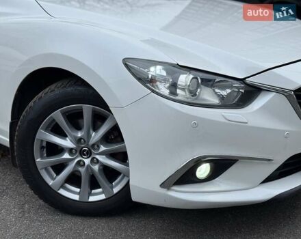 Белый Мазда 6, объемом двигателя 2 л и пробегом 171 тыс. км за 10900 $, фото 9 на Automoto.ua