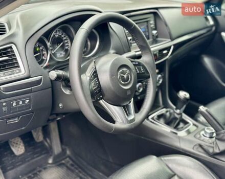 Белый Мазда 6, объемом двигателя 2 л и пробегом 171 тыс. км за 10900 $, фото 4 на Automoto.ua