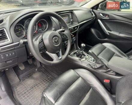 Белый Мазда 6, объемом двигателя 2 л и пробегом 171 тыс. км за 10900 $, фото 16 на Automoto.ua