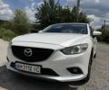 Белый Мазда 6, объемом двигателя 2 л и пробегом 219 тыс. км за 10600 $, фото 1 на Automoto.ua