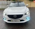Белый Мазда 6, объемом двигателя 2 л и пробегом 192 тыс. км за 12000 $, фото 1 на Automoto.ua