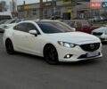 Белый Мазда 6, объемом двигателя 2 л и пробегом 199 тыс. км за 9299 $, фото 2 на Automoto.ua