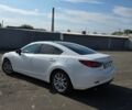Білий Мазда 6, об'ємом двигуна 2 л та пробігом 196 тис. км за 11900 $, фото 12 на Automoto.ua