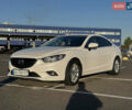Белый Мазда 6, объемом двигателя 2 л и пробегом 176 тыс. км за 12800 $, фото 1 на Automoto.ua