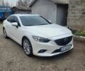 Белый Мазда 6, объемом двигателя 2.5 л и пробегом 186 тыс. км за 11504 $, фото 1 на Automoto.ua
