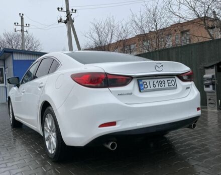 Білий Мазда 6, об'ємом двигуна 2 л та пробігом 108 тис. км за 13000 $, фото 4 на Automoto.ua