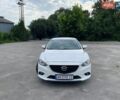 Белый Мазда 6, объемом двигателя 2 л и пробегом 219 тыс. км за 10800 $, фото 1 на Automoto.ua