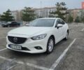 Белый Мазда 6, объемом двигателя 2 л и пробегом 225 тыс. км за 11999 $, фото 1 на Automoto.ua
