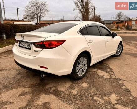 Белый Мазда 6, объемом двигателя 2.49 л и пробегом 165 тыс. км за 11000 $, фото 2 на Automoto.ua