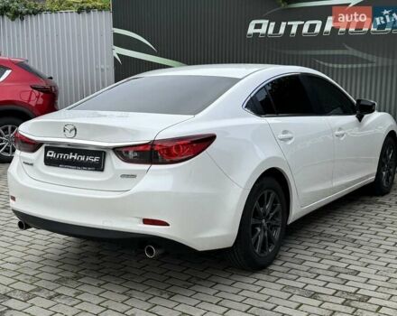 Білий Мазда 6, об'ємом двигуна 2 л та пробігом 145 тис. км за 12900 $, фото 34 на Automoto.ua