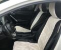 Білий Мазда 6, об'ємом двигуна 2 л та пробігом 135 тис. км за 12895 $, фото 6 на Automoto.ua