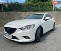 Білий Мазда 6, об'ємом двигуна 2 л та пробігом 135 тис. км за 12500 $, фото 1 на Automoto.ua