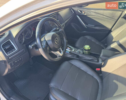 Білий Мазда 6, об'ємом двигуна 2 л та пробігом 145 тис. км за 17000 $, фото 18 на Automoto.ua