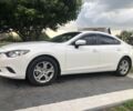 Білий Мазда 6, об'ємом двигуна 2 л та пробігом 135 тис. км за 12895 $, фото 19 на Automoto.ua