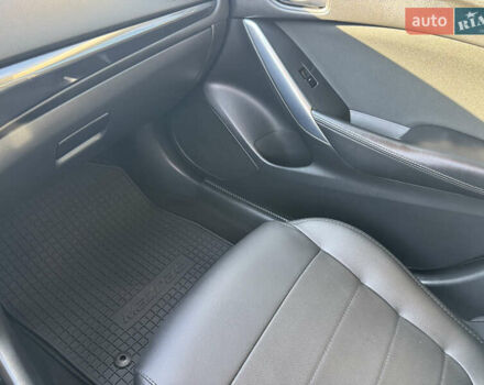 Білий Мазда 6, об'ємом двигуна 2 л та пробігом 145 тис. км за 17000 $, фото 17 на Automoto.ua