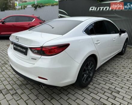 Білий Мазда 6, об'ємом двигуна 2 л та пробігом 145 тис. км за 12900 $, фото 37 на Automoto.ua